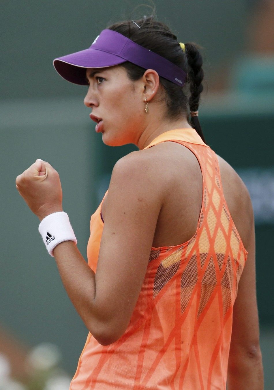 Garbine Muguruza of Spain reacts during her womens singles match against Serena Williams of the U.S. at the French Open tennis tournament at the Roland Garros stadium in Paris May 28, 2014. 