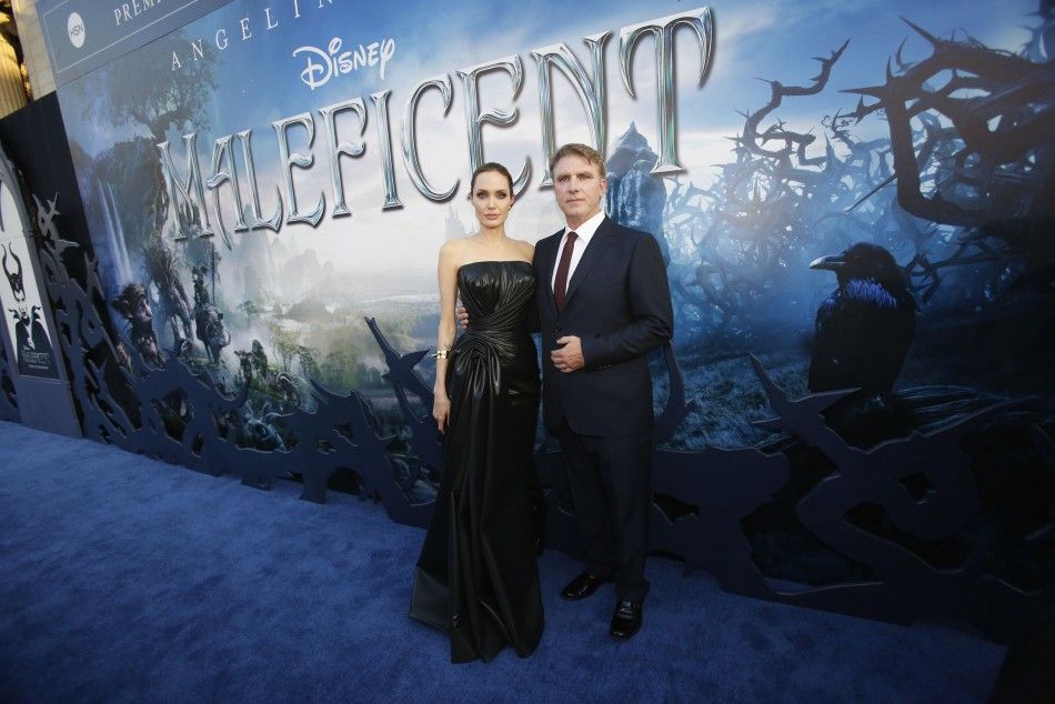 Angelina Jolie and director of the movie Robert Stromberg pose at the premiere of quotMaleficentquot 