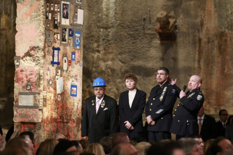 First responders Manny Rodriguez, Pia Hofmann, Det. Anthony Favara, of the NYPD and Lt. Stephen Butler, of the Port Authority Police, speak next to the &quot;Last Beam&quot; during the dedication ceremony at the National September 11 Memorial Museum in Ne