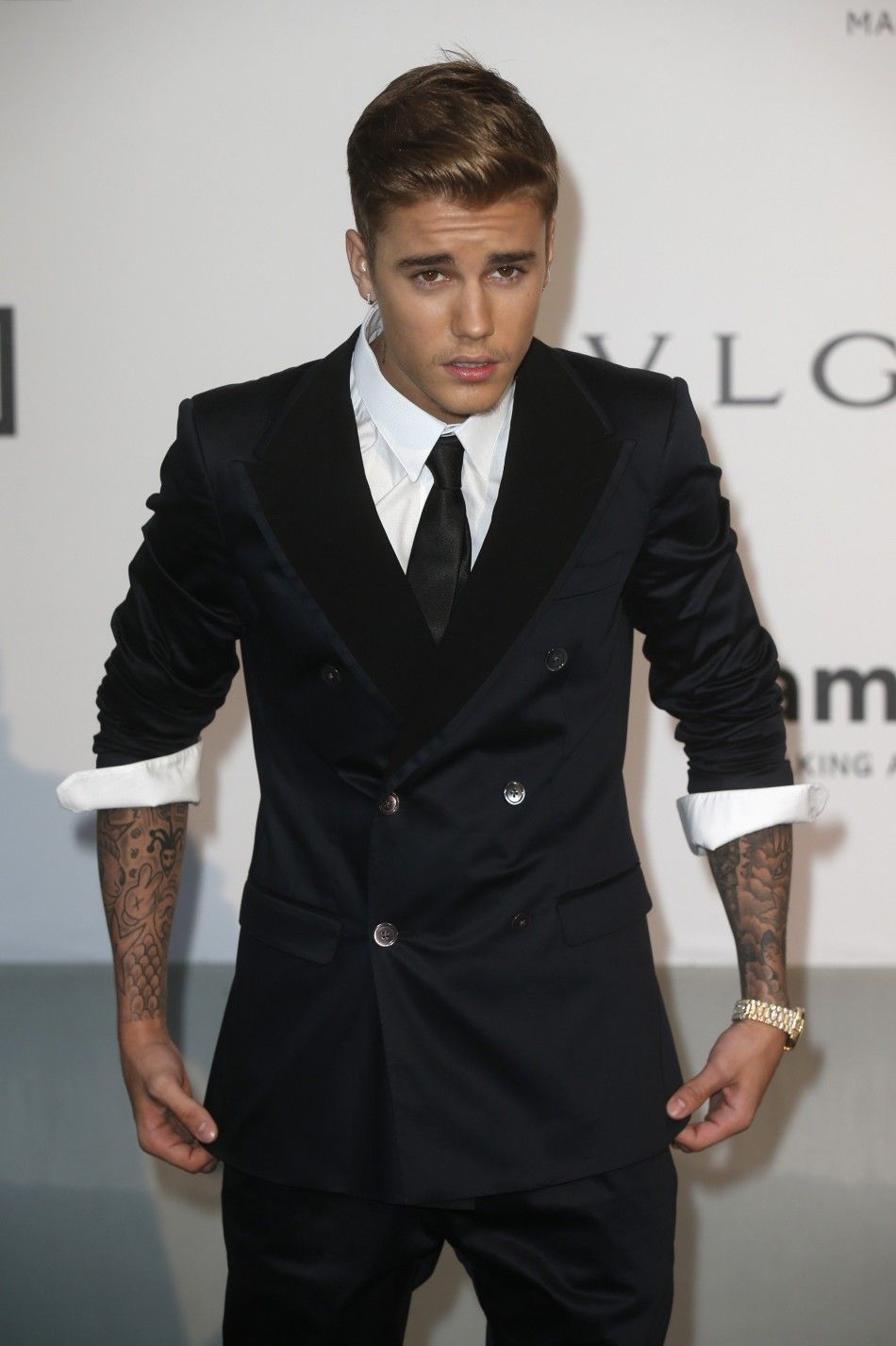 Canadian pop singer Justin Bieber arrives for amfARs Cinema Against AIDS 2014 event in Antibes during the 67th Cannes Film Festival May 22, 2014. REUTERSBenoit Tessier