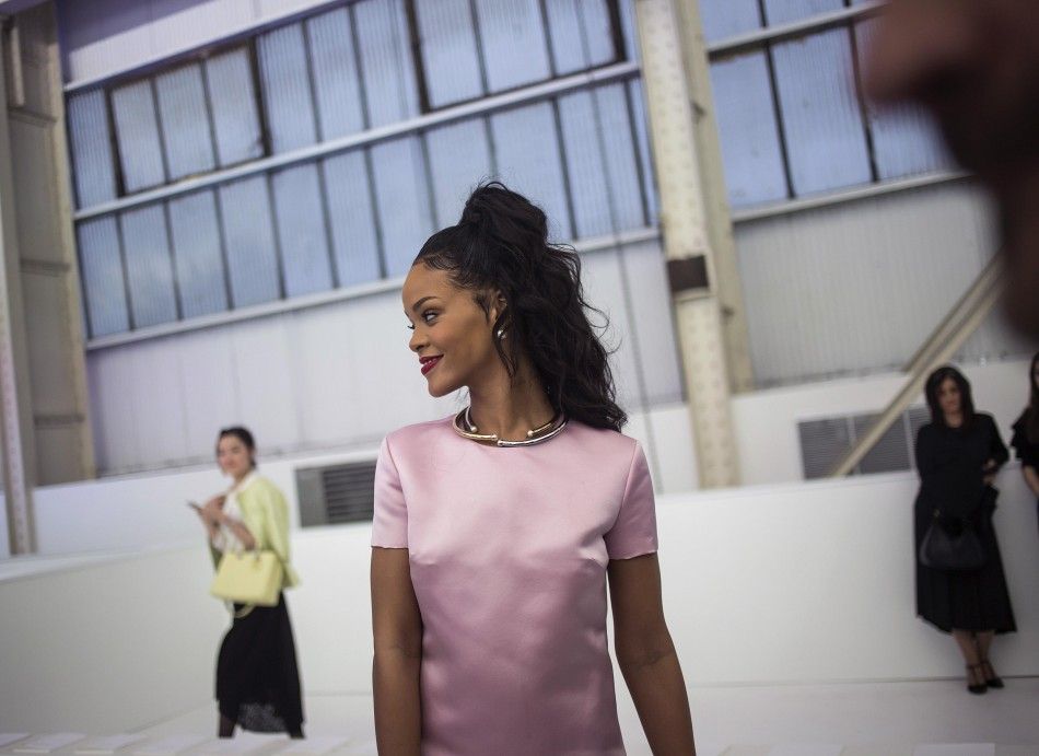 Musician Rihanna attends the Cruise 2015 collection show from French fashion house Christian Dior in the Brooklyn borough of New York May 7, 2014. REUTERSEric Thayer 