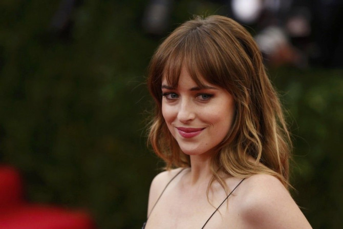 Actress Dakota Johnson arrives at the Metropolitan Museum of Art Costume Institute Gala Benefit celebrating the opening of &quot;Charles James: Beyond Fashion&quot; in Upper Manhattan