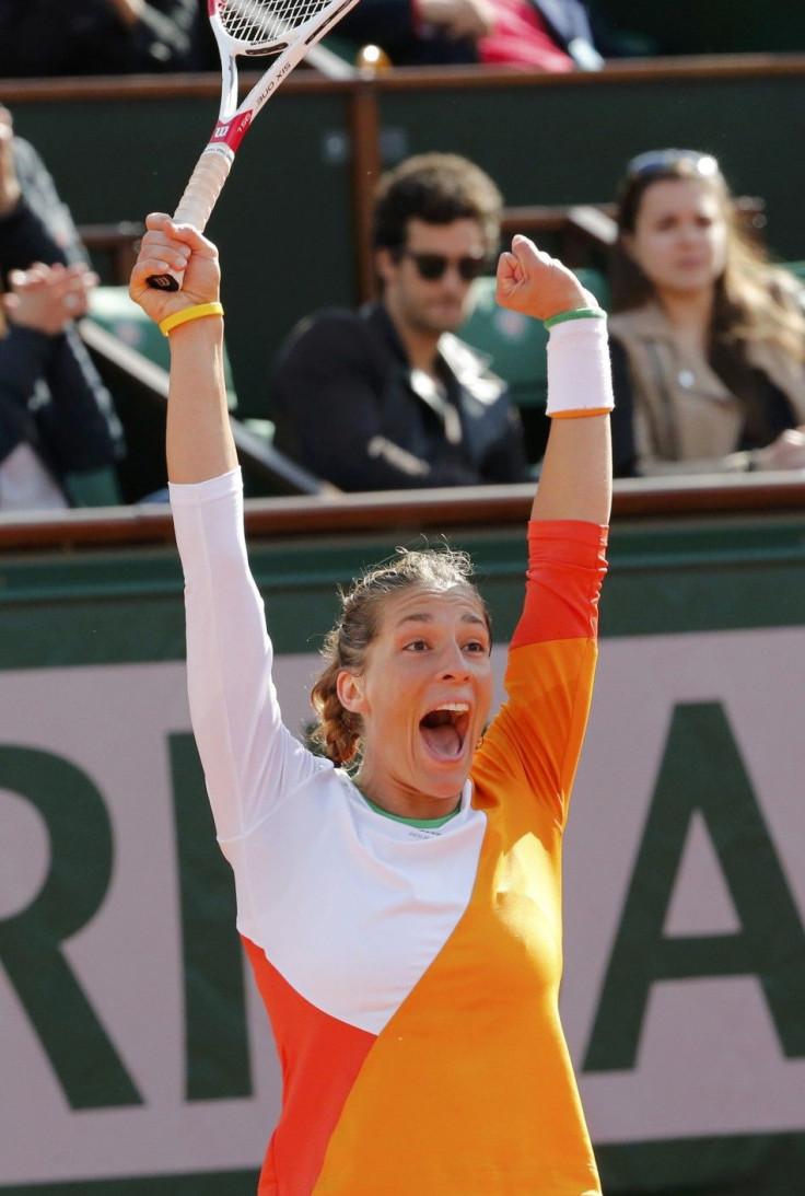 Andrea Petkovic of Germany reacts after winning her women's quarter-final match against Sara Errani of Italy at the French Open tennis tournament at the Roland Garros stadium in Paris June 4, 2014. 