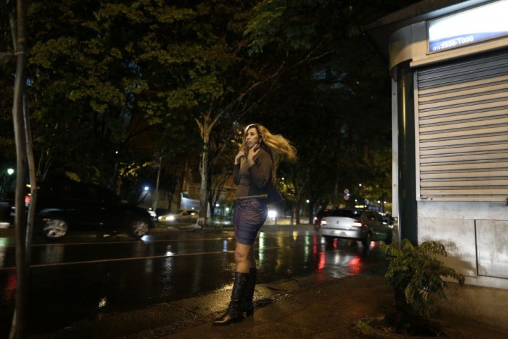 Cida Vieira, president of the Association of Prostitutes of Minas Gerais, looks for clients along a street in Belo Horizonte, November 5, 2013. A group of sex workers are taking English classes once a week in preparation for the World Cup. They hope these