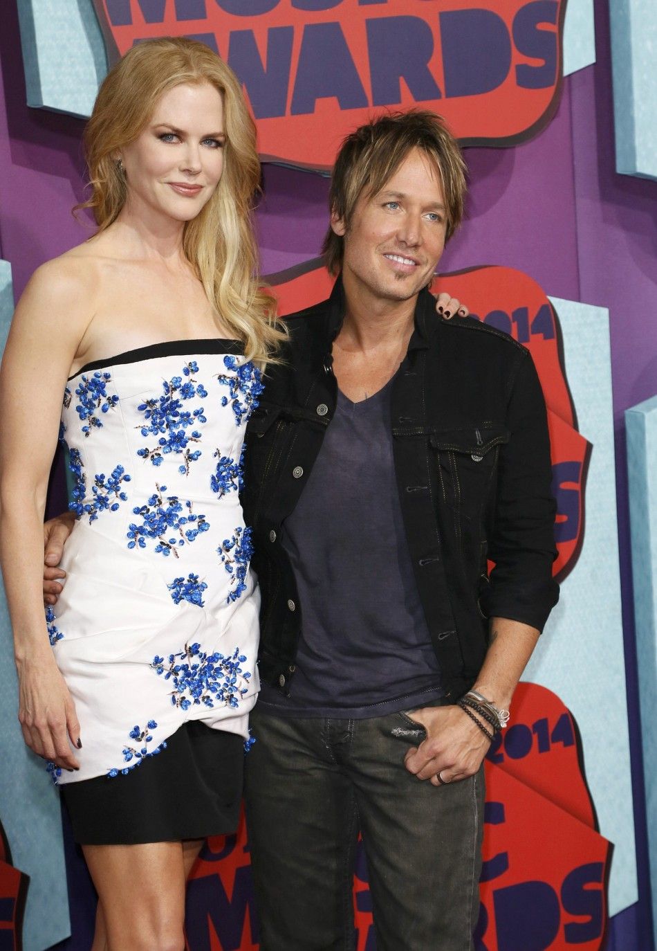 Actress Nicole Kidman and her husband, musician Keith Urban, arrive at the 2014 CMT Music Awards in Nashville