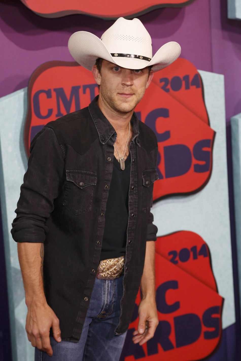 Musician Justin Moore arrives at the 2014 CMT Music Awards in Nashville