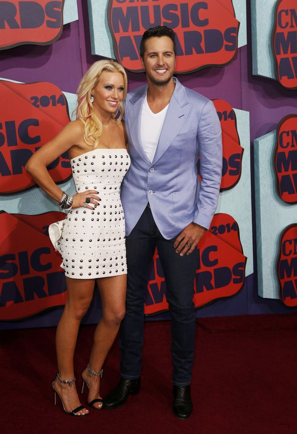Caroline Boyer and Luke Bryan arrive at the 2014 CMT Music Awards in Nashville