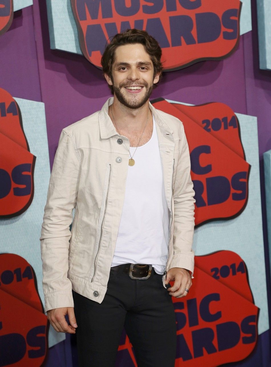 Musician Thomas Rhett arrives at the 2014 CMT Music Awards in Nashville