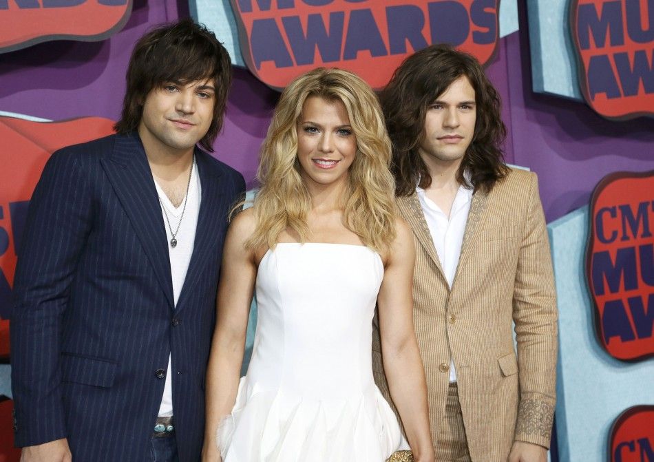 Neil Perry, Kimberly Perry and Reid Perry of The Band Perry arrive at the 2014 CMT Music Awards in Nashville