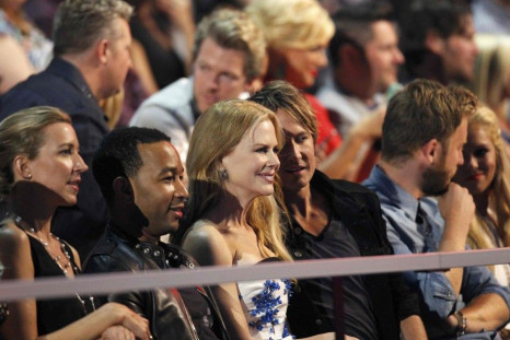 Nicole Kidman and musician Keith Urban sit in the audience during the 2014 CMT Music Awards in Nashville