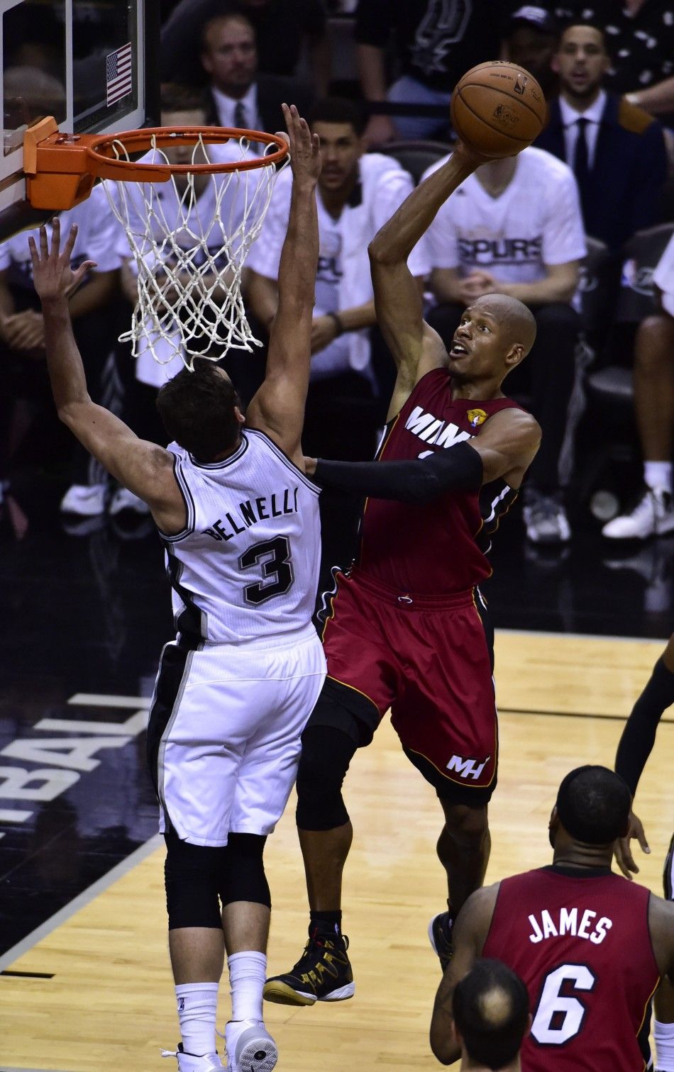 Jun 5, 2014 San Antonio, TX, USA Miami Heat guard Ray Allen 34 shoots against San Antonio Spurs guard Marco Belinelli 2 during the second half in game one of the 2014 NBA Finals at ATT Center. 