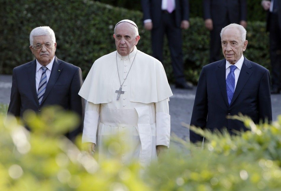 L-R Palestinian President Mahmoud Abbas, Pope Francis and Israeli President Shimon Peres arrive in the Vatican Gardens to pray together at the Vatican June 8, 2014. REUTERSMax Rossi VATICAN - Tags RELIGION POLITICS
