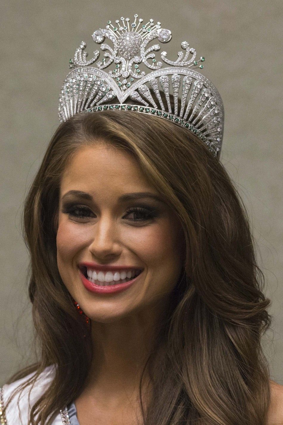 Miss Nevada Nia Sanchez arrives at a news conference after winning the 2014 Miss USA beauty pageant in Baton Rouge, Louisiana
