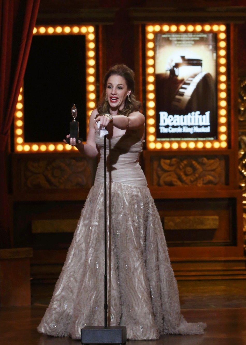 Jessie Mueller accepts the Award for Best Performance by a Leading Actress in a Musical for quotBeautiful The Carole King Musicalquot during the American Theatre Wings 68th annual Tony Awards at Radio City Music Hall in New York, June 8, 2014.