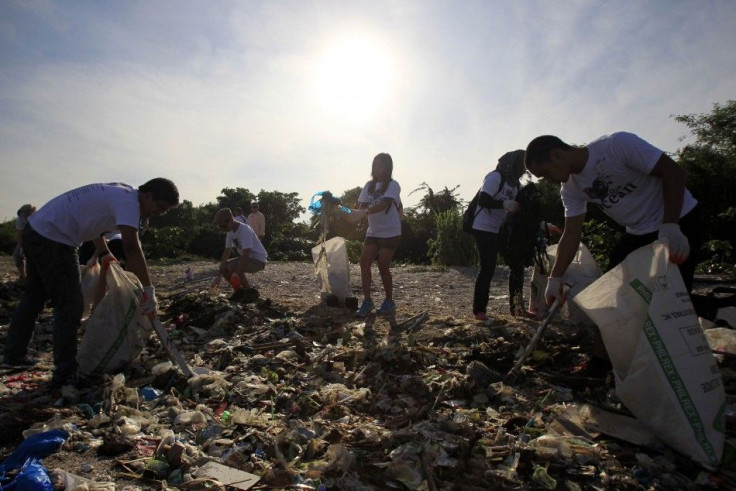 Students take part in a coastal cleanup at the Las Pinas-Paranaque Critical Habitat and Ecotourism area also known as 'Freedom Island', a haven for local migratory birds, during a World Oceans Day event in Las Pinas city, south of Manila June 9, 2014. Wor