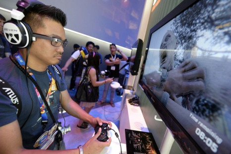 Danilo Napalan Plays the New Zombie Survival Game 'Dying Light' in the Warner Bros. Booth at E3 in Los Angeles