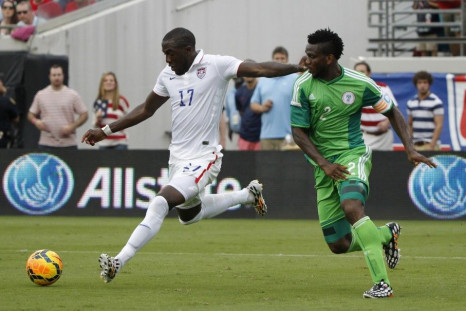 Jun 7, 2014; Jacksonville, FL, USA; (Editors note: Caption correction) United States forward Jozy Altidore (17) scores a goal as Nigeria defender Joseph Yobo (2) attempted to defend during the second half at EverBank Field. United States defeated Nigeria 
