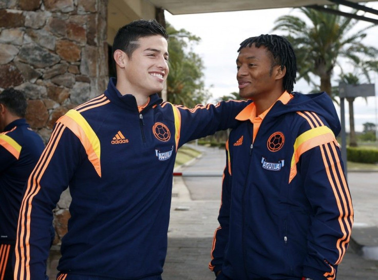 Colombia&#039;s Cuadrado and Rodriguez talk at the squad&#039;s hotel headquarters ahead their friendly match against Jordan in preparation for the 2014 World Cup in Buenos Aires