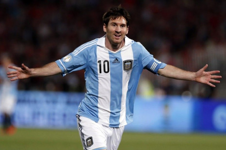 Argentina's Lionel Messi celebrates after he scored his team's first goal against Chile during the 2014 World Cup qualifying soccer match in Santiago, in this October 16, 2012 file photo. With the soccer World Cup only three months away, Adidas and Nike a