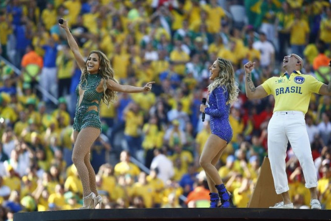 Singers Jennifer Lopez, Claudia Leitte and Pitbull perform during the opening ceremony of the 2014 World Cup at the Corinthians arena in Sao Paulo June 12, 2014.