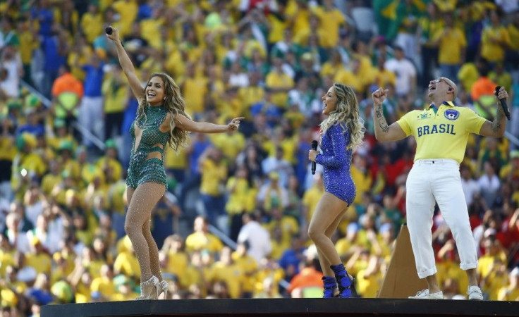 Singers Jennifer Lopez, Claudia Leitte and Pitbull perform during the opening ceremony of the 2014 World Cup at the Corinthians arena in Sao Paulo June 12, 2014.