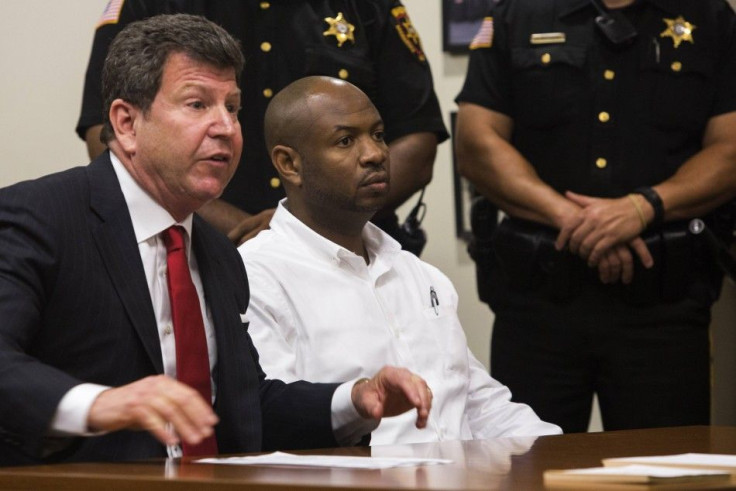 Truck driver Kevin Roper looks on next to defense attorney David Glassman (L) during his hearing at a courthouse in New Brunswick, New Jersey June 11, 2014.