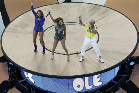 Pitbull, Jennifer Lopez and Claudia Leitte perform during the 2014 World Cup opening ceremony at the Corinthians arena in Sao Paulo