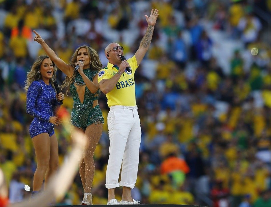 Pitbull, Jennifer Lopez and Claudia Leitte perform during the 2014 World Cup opening ceremony at the Corinthians arena in Sao Paulo