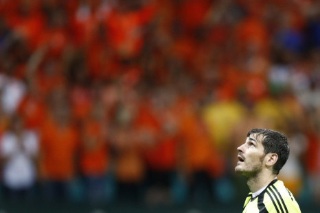 Spain&#039;s goalkeeper Casillas reacts after a goal by Netherlands during their 2014 World Cup Group B soccer match at the Fonte Nova arena in Salvador