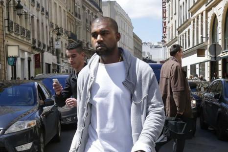 Rapper Kanye West arrives at a fashion designer shop in Paris May 22, 2014.