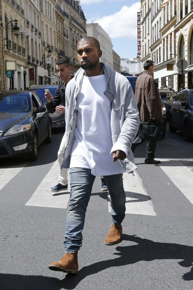Rapper Kanye West arrives at a fashion designer shop in Paris May 22, 2014.