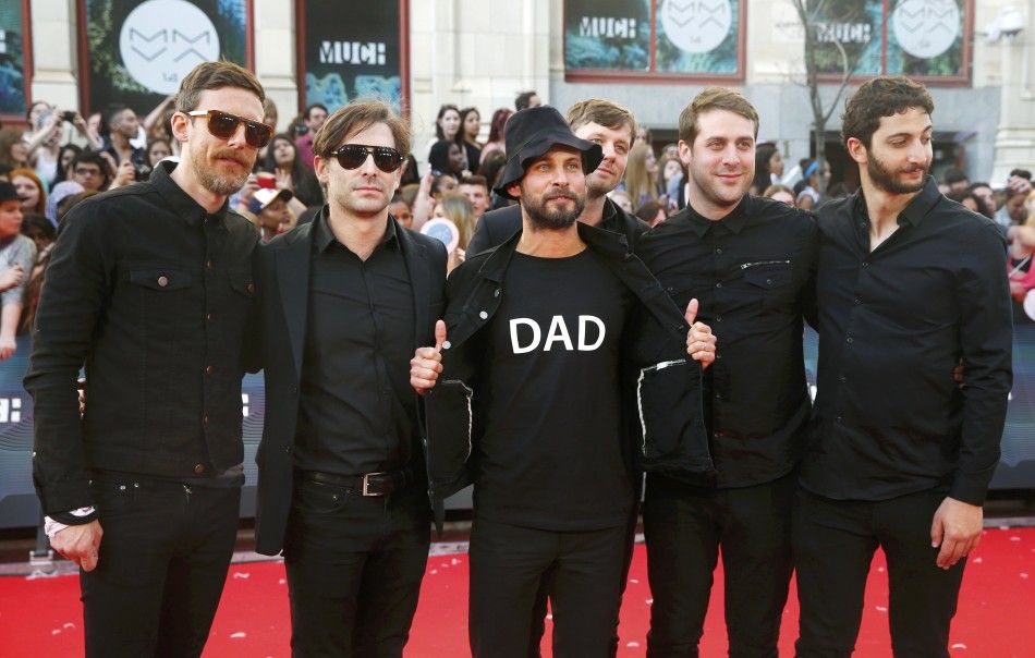 Sam Roberts displays a Dad t- shirt with the rest of the Sam Roberts band on the red carpet at the MuchMusic Video Awards MMVA in Toronto