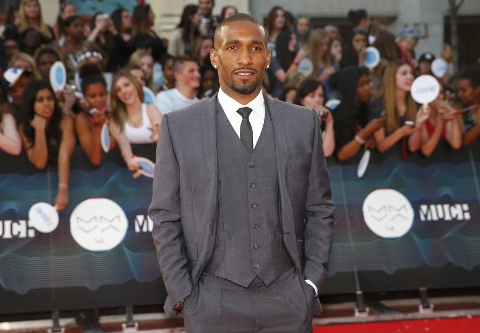 Soccer player Jermain Defoe arrives on the red carpet at the MuchMusic Video Awards MMVA in Toronto