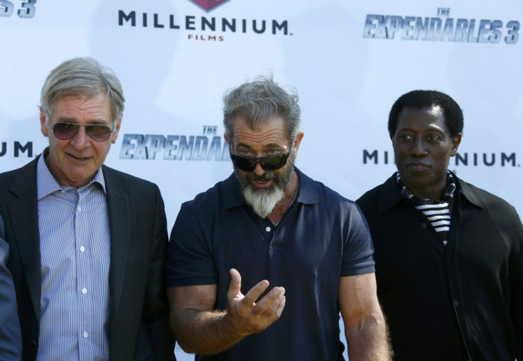 Cast members Harrison Ford, Mel Gibson and Wesley Snipes pose during a photocall on the Croisette to promote the film &quot;The Expendables 3&quot; during the 67th Cannes Film Festival in Cannes