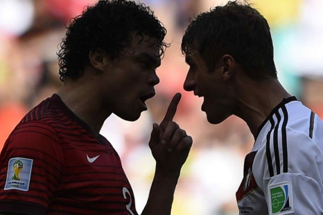 Portugal's Pepe argues with Germany's Thomas Mueller (R) during their 2014 World Cup Group G soccer match at the Fonte Nova arena in Salvador, June 16, 2014. 