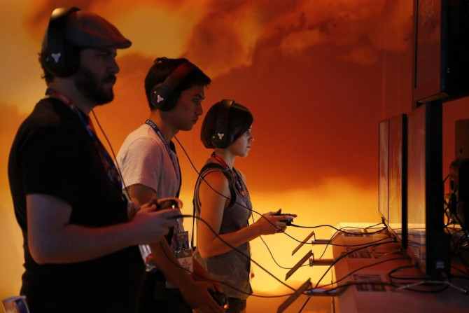 Gamers Play a Game by Bungie Inc. at the 2014 Electronic Entertainment Expo, Known as E3, in Los Angeles