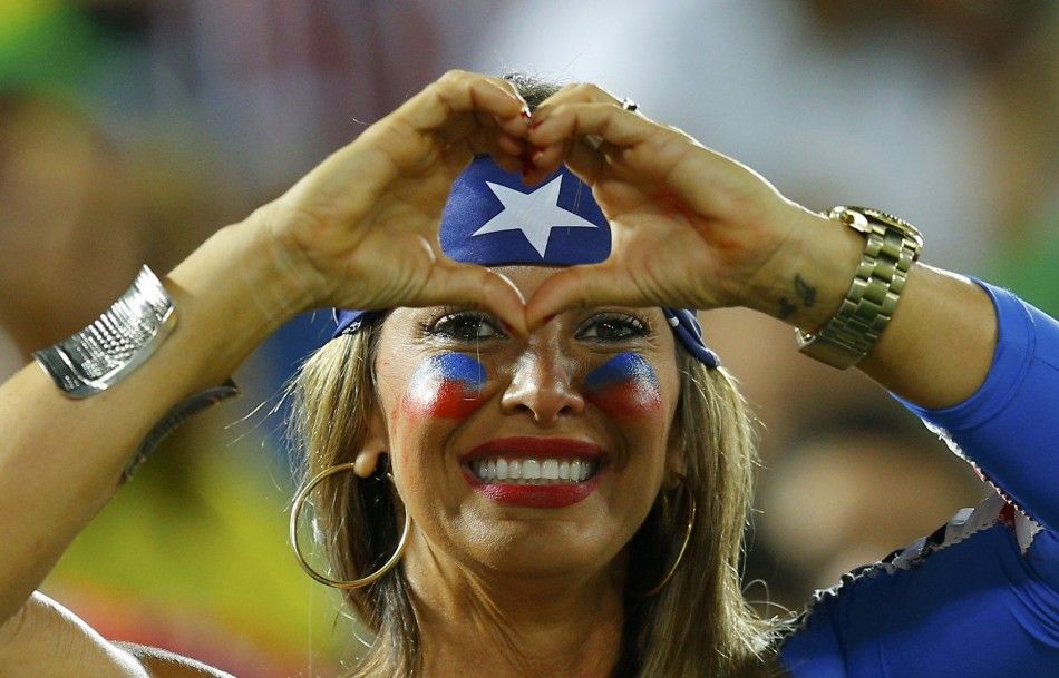 A U.S.A fan poses at half time 