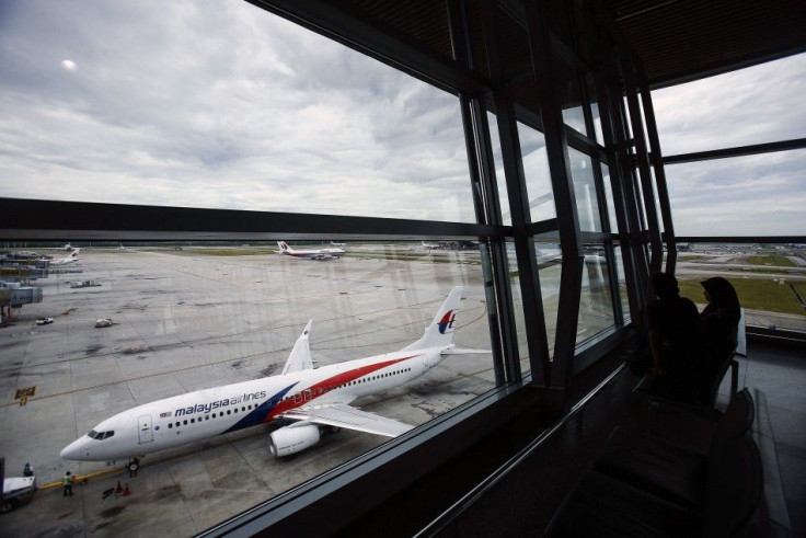 A Malaysia Airlines Boeing 737-800 aircraft parks on tarmac of Kuala Lumpur International Airport outside Kuala Lumpur June 14, 2014. 