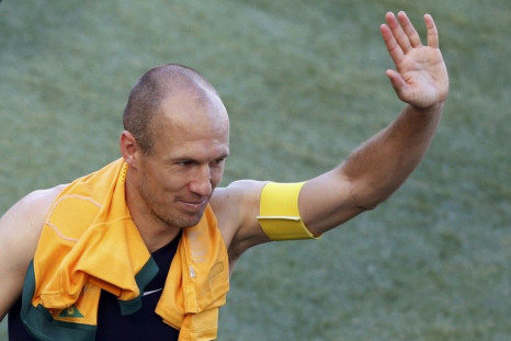 Robben of the Netherlands waves after the 2014 World Cup Group B soccer match against Australia at the Beira Rio stadium in Porto Alegre