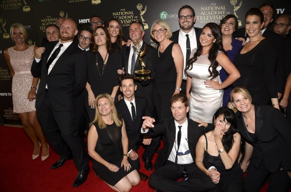 Producers of The Ellen DeGeneres Show Pose Backstage with the Award for Outstanding Talk ShowEntertainment During the 41st Annual Daytime Emmy Awards in Beverly Hills
