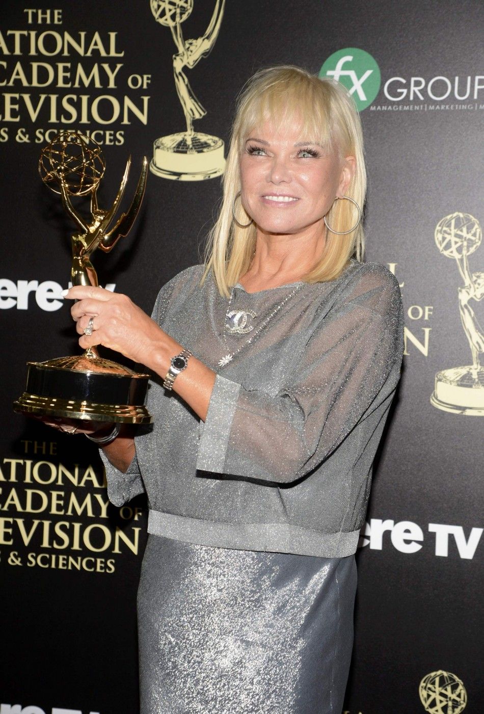 Linda Bell Blue of Entertainment Tonight Poses Backstage with the Award for Outstanding Entertainment News Program During the 41st Annual Daytime Emmy Awards in Beverly Hills
