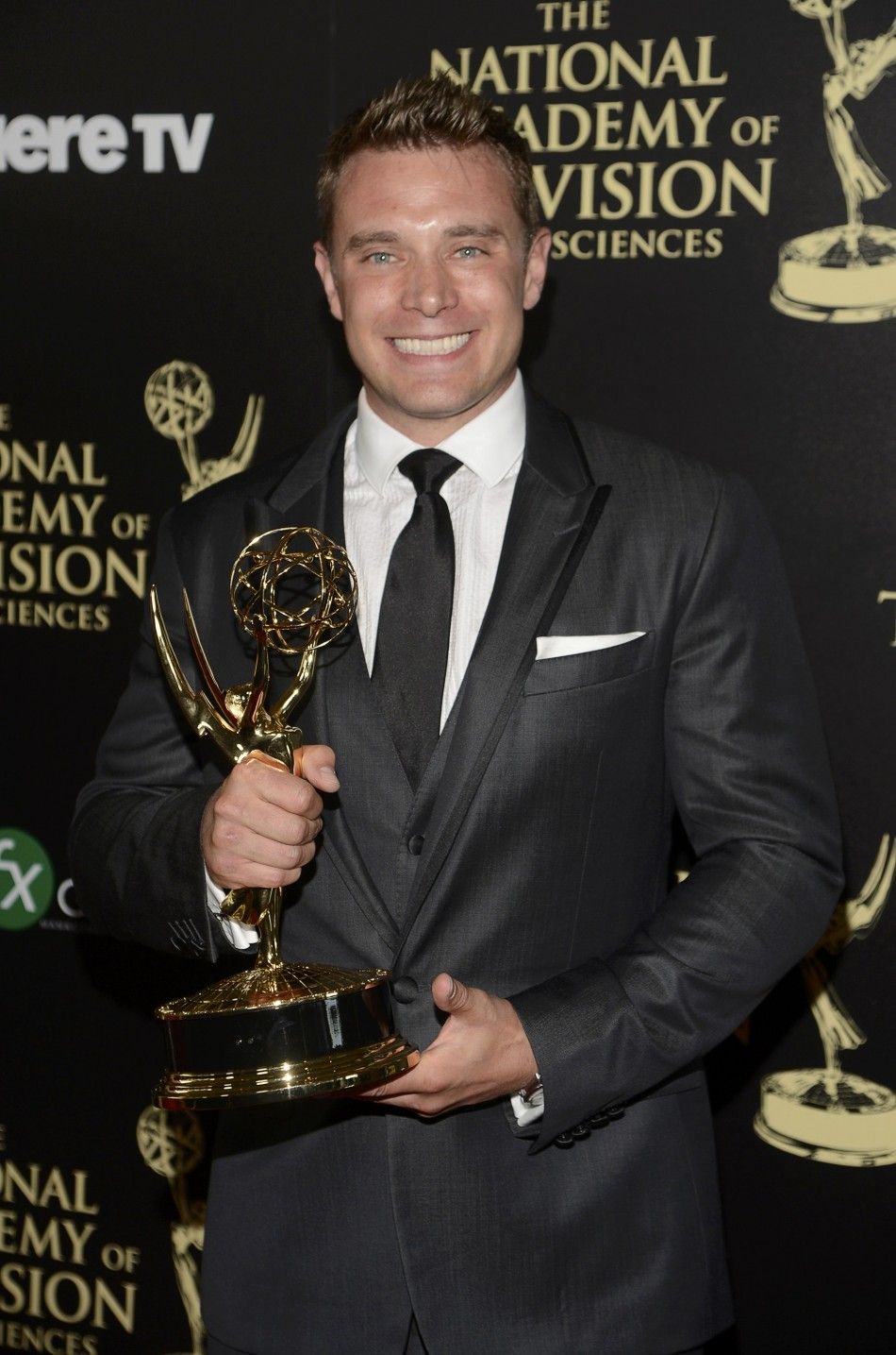 Billy Miller Poses Backstage with the Award for Outstanding Lead Actor in a Drama Series for His Role on The Young and the Restless During the 41st Annual Daytime Emmy Awards in Beverly Hills