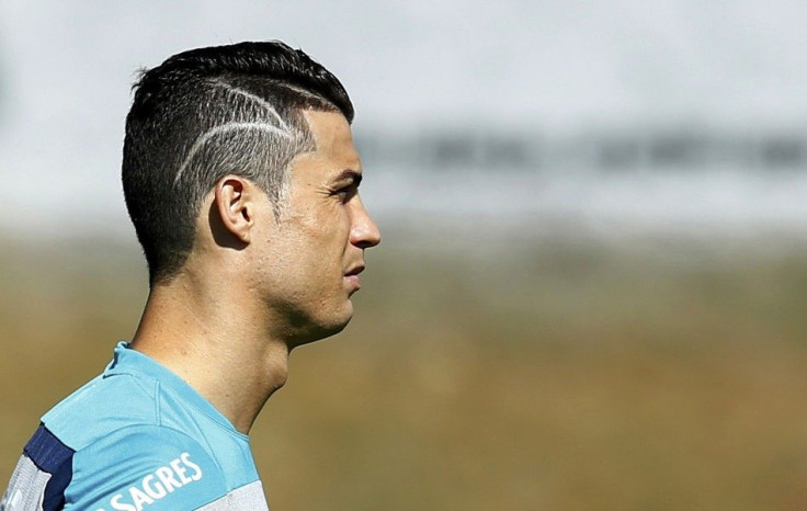 Portugal&#039;s Cristiano Ronaldo takes part in a training session ahead of the team&#039;s 2014 World Cup soccer match against Ghana, in Campinas, June 24, 2014 .   REUTERS/Mauro Horita