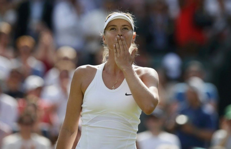 Maria Sharapova Of Russia Blows A Kiss After Defeating Samantha Murray Of Britain In Their Women's Singles Ttennis Match At The Wimbledon Tennis Championships, In London