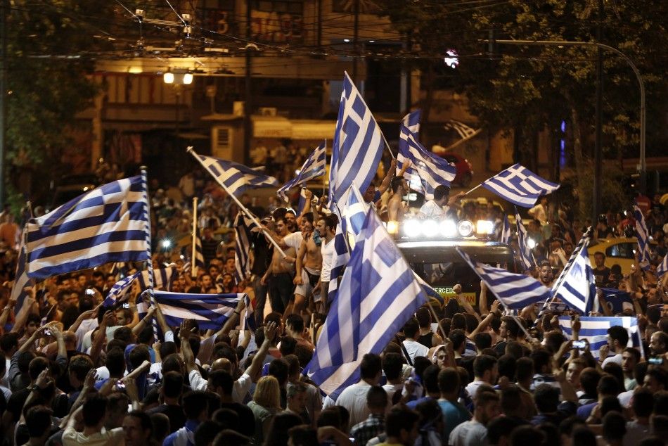 Greek fans celebrate their teams victory 