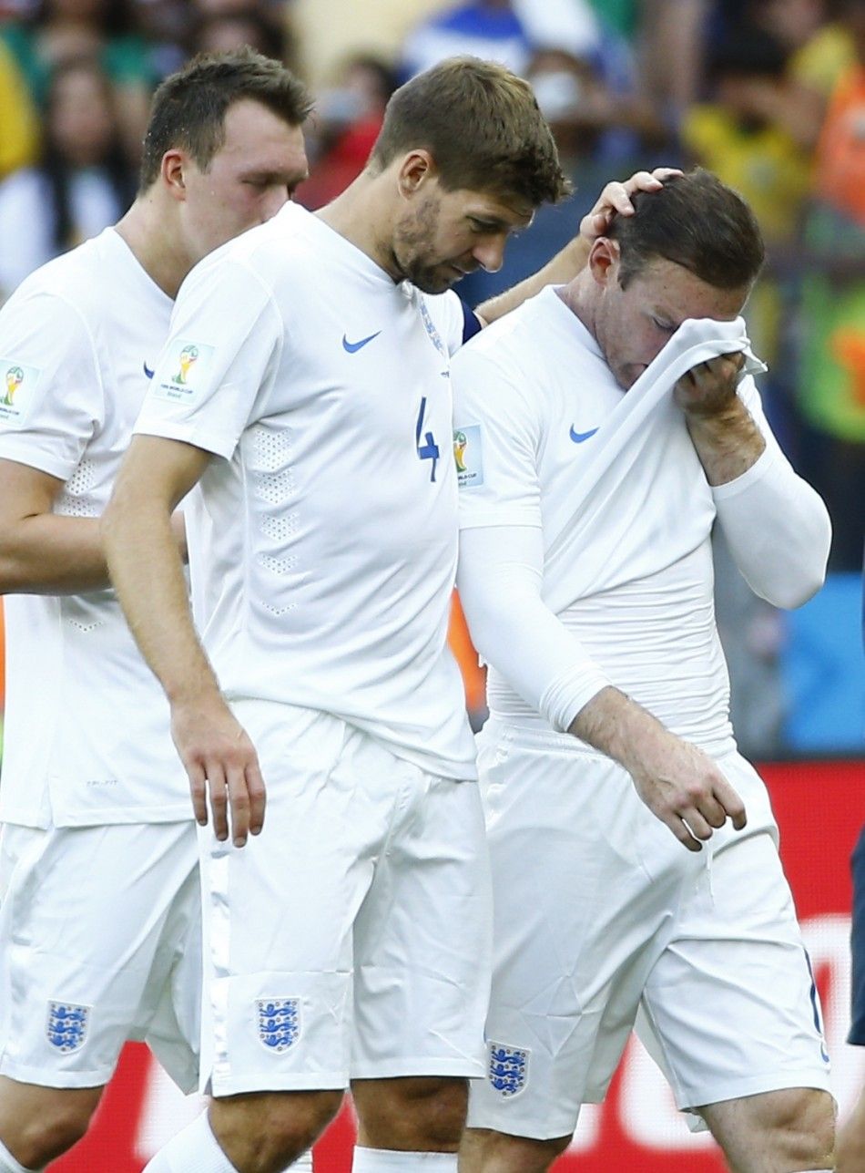 Englands Phil Jones ,Steven Gerrard  and Wayne Rooney 