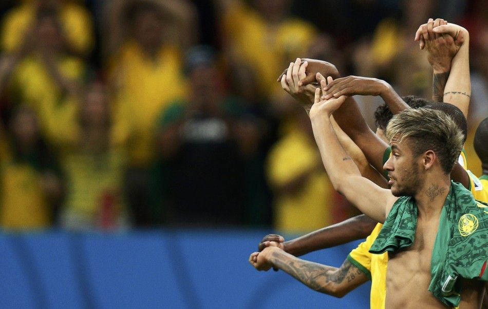 Brazils Neymar Celebrates Their Win Against Cameroon After Their 2014 World Cup Group A Soccer Match at the Brasilia National Stadium in Brasilia