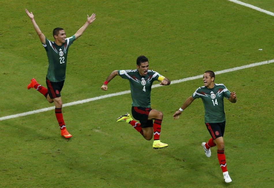 Mexicos Marquez Celebrates After Scoring Against Croatia During Their 2014 World Cup Group A Soccer Match in Recife