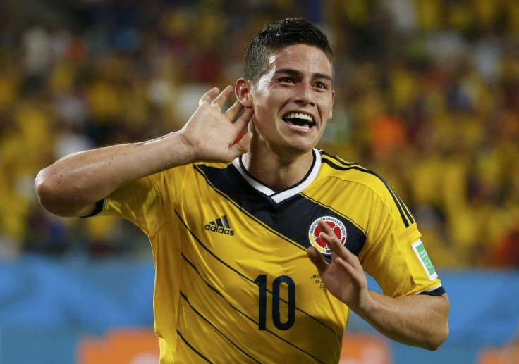 Colombia&#039;s James Rodriguez celebrates after scoring a goal during the 2014 World Cup Group C soccer match between Japan and Colombia at the Pantanal arena
