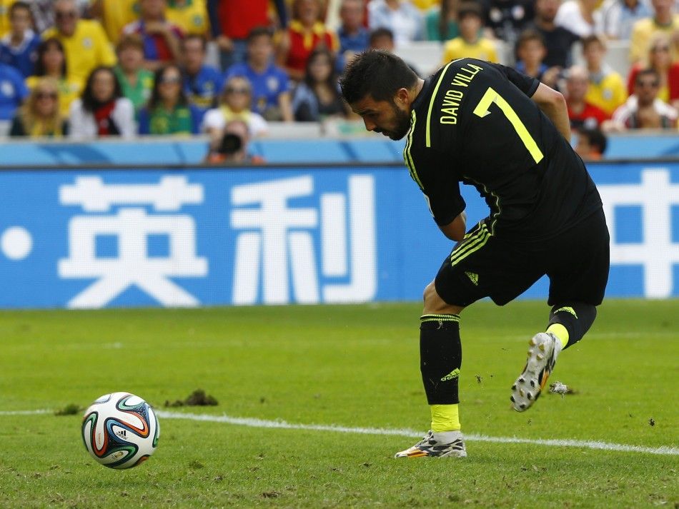 Spains David Villa scores a goal 